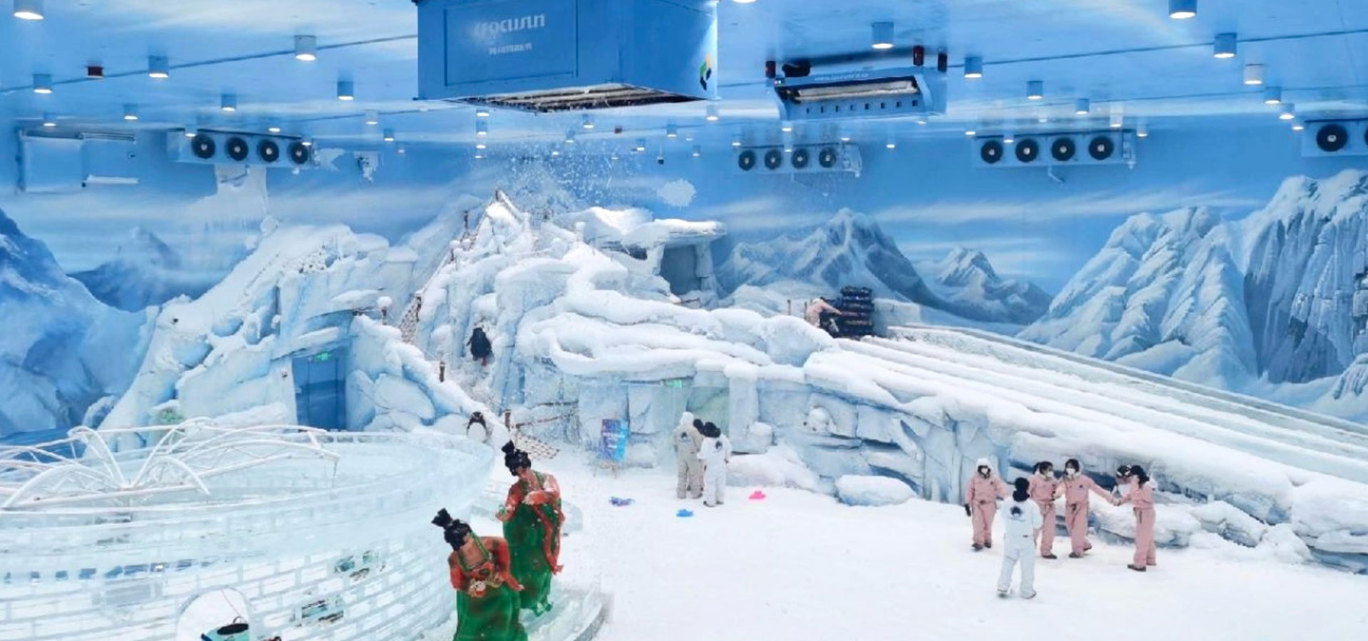 Air cooler system for indoor snow parks and ice rinks, providing efficient cooling, ventilation, and climate control.