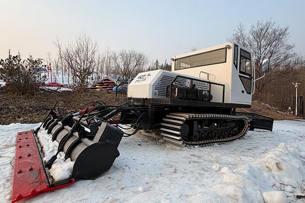 Rear auger of a Focusun snow groomer designed for efficient snow tilling and smooth slope preparation.