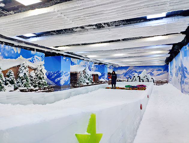 Indoor snow park featuring Focusun ground cooling system with aluminum pipe refrigeration technology for reliable snow surface cooling.