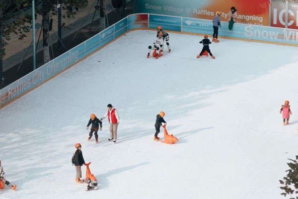 Ice rink installed in a leisure center with reliable refrigeration technology for public skating and recreational activities.