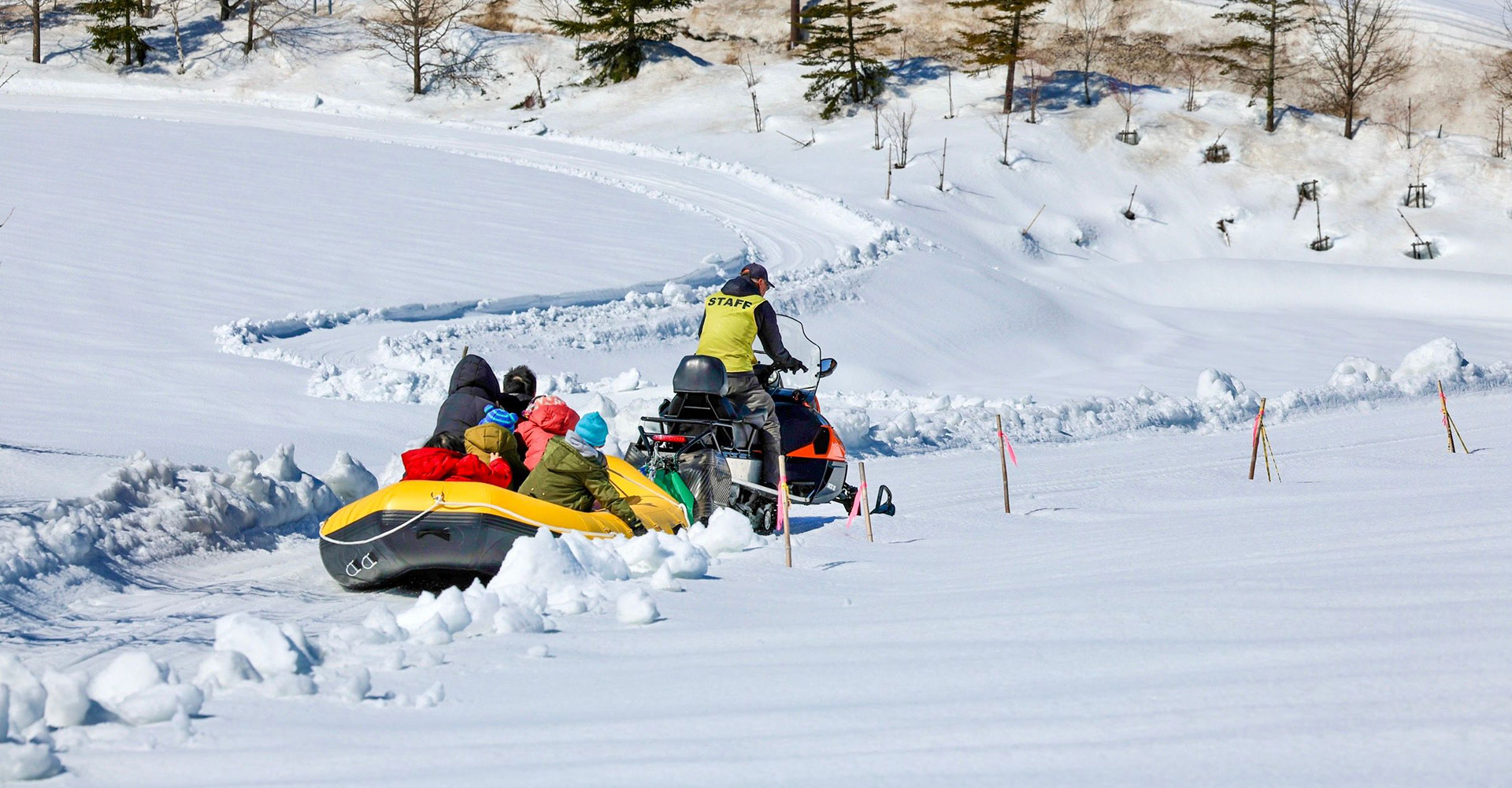 Snowmobile for outdoor snow parks and winter attractions, providing exciting snow activities and recreational experiences.